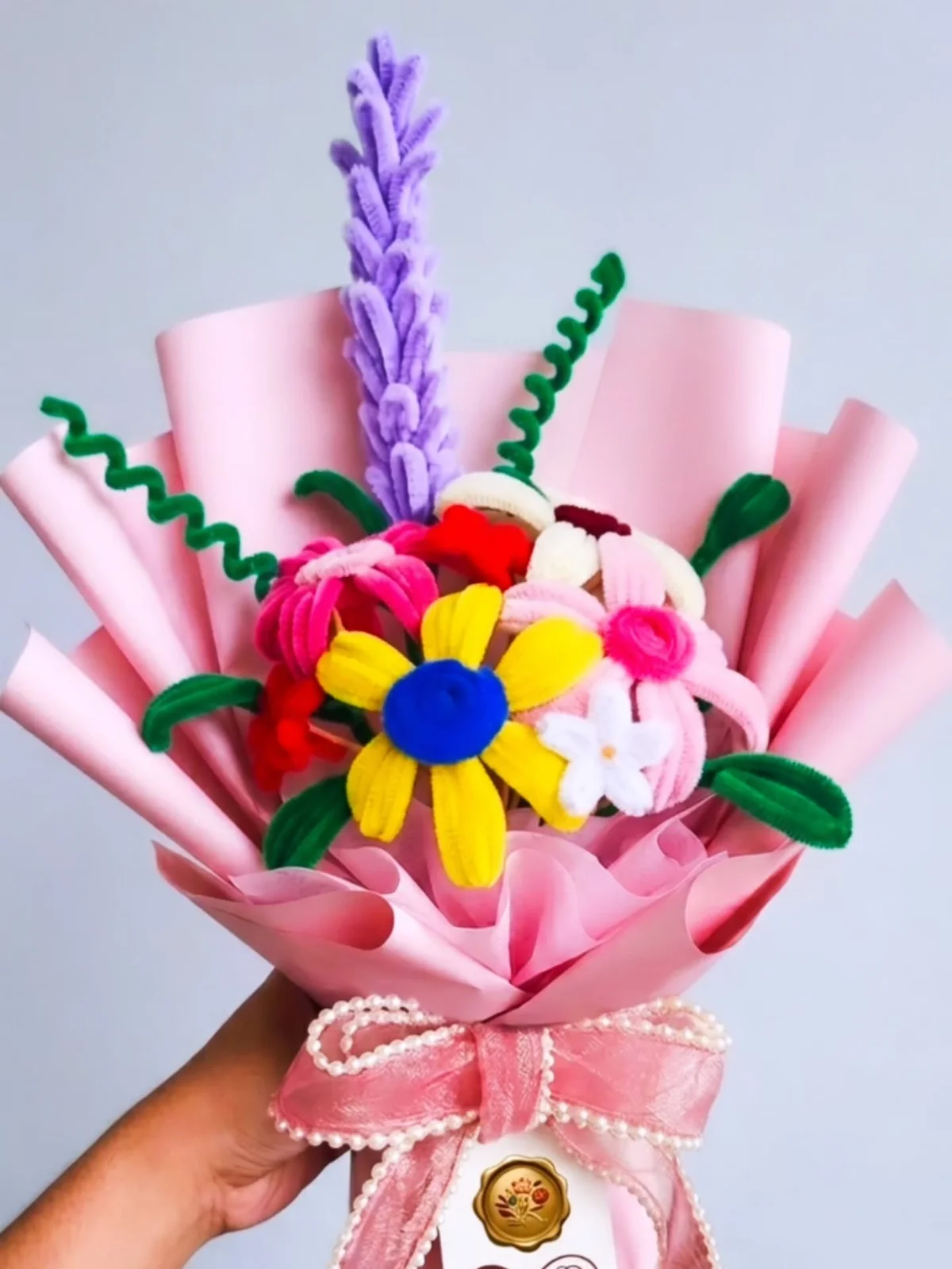 Handcrafted pastel pipe-cleaner floral bouquet with pearl ribbon by Little Luxe Hamper